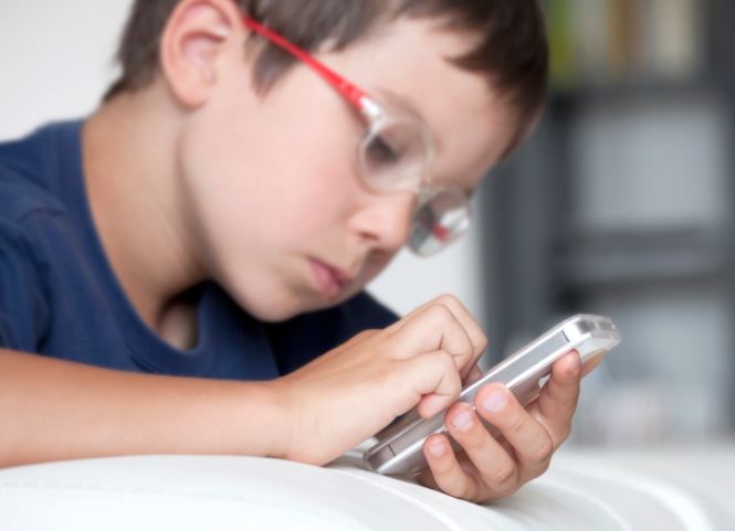 kids using electronic devices from a young age